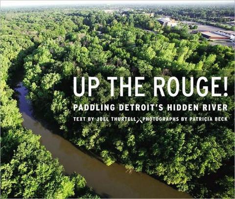 Aerial view of the Rouge River, surrounded by lush greenery, highlighting the natural beauty of Detroit's hidden river. Text overlay promotes exploration.